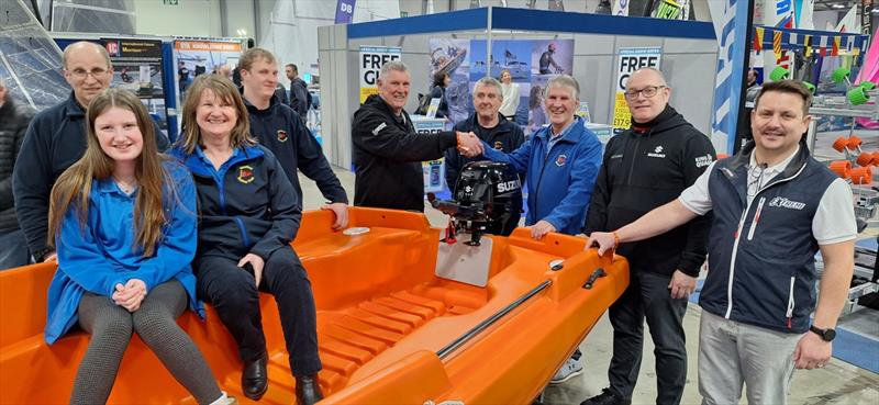 Suzuki, Rigiflex and Extreme Trailers handover a club safety boat package to Gresford SC photo copyright Suzuki Marine taken at RYA Dinghy Show and featuring the  class