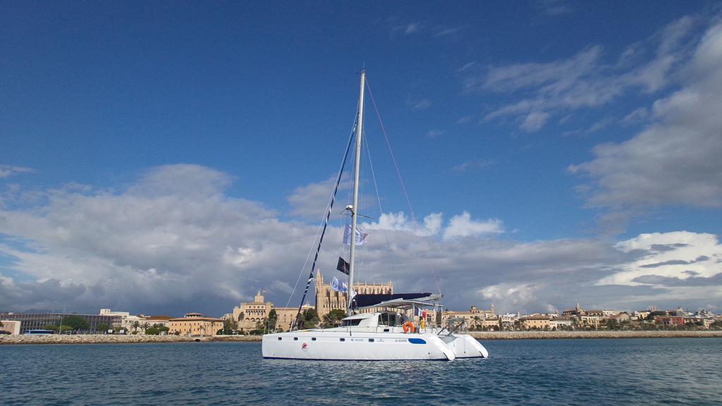 Arriving into Palma de Mallorca, with the stunning cathedral photo copyright Mission Océan taken at  and featuring the  class