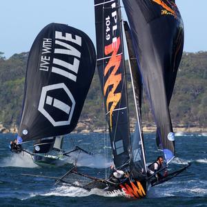 Race 1 – Triple M, home just ahead of ILVE – 18ft Skiffs NSW Championship photo copyright  Frank Quealey / Australian 18 Footers League taken at  and featuring the  class