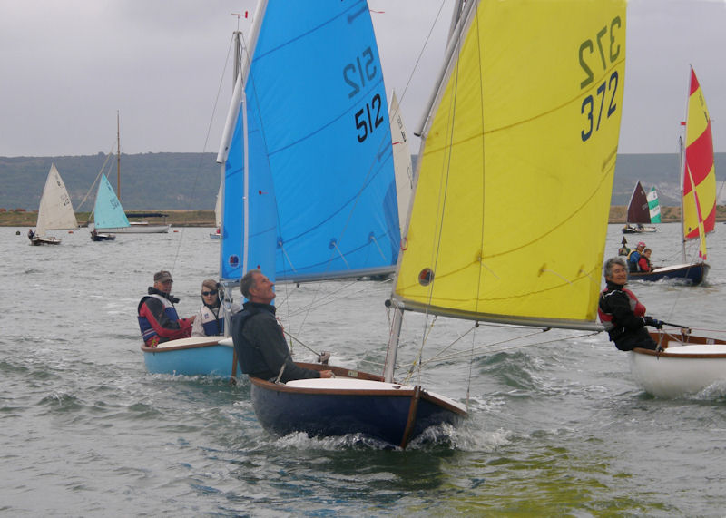 Philip Shute in Tourbillon leads Jo Lowis and David & Kate Carslaw during the Lymington River Scow nationals in Keyhaven photo copyright John Claridge taken at Keyhaven Yacht Club and featuring the Scow class