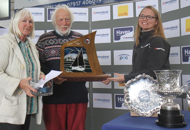 Peter Fontes is presented with the Shrimper class trophy by Kate Moss at the International Paint Poole Regatta prize giving photo copyright Mark Jardine taken at  and featuring the Shrimper class