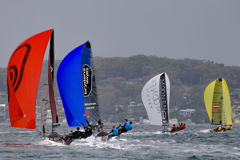 First spinnaker run in Race 8 on day 5 of the Red Pumps 16ft Skiff Australian Championships 2021-22 photo copyright Michael Chittenden taken at Belmont 16ft Sailing Club and featuring the 16ft Skiff class