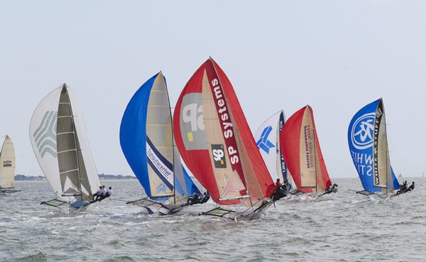 Three stringing back in the Solent on Day 2 of the Calshot 18ft Skiff Grand Prix photo copyright Peter Danby taken at Calshot Sailing Club and featuring the 18ft Skiff class
