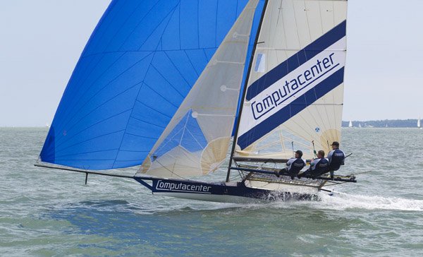 Computacenter powers downwind on Day 2 of the Calshot 18ft Skiff Grand Prix photo copyright Peter Danby taken at Calshot Sailing Club and featuring the 18ft Skiff class