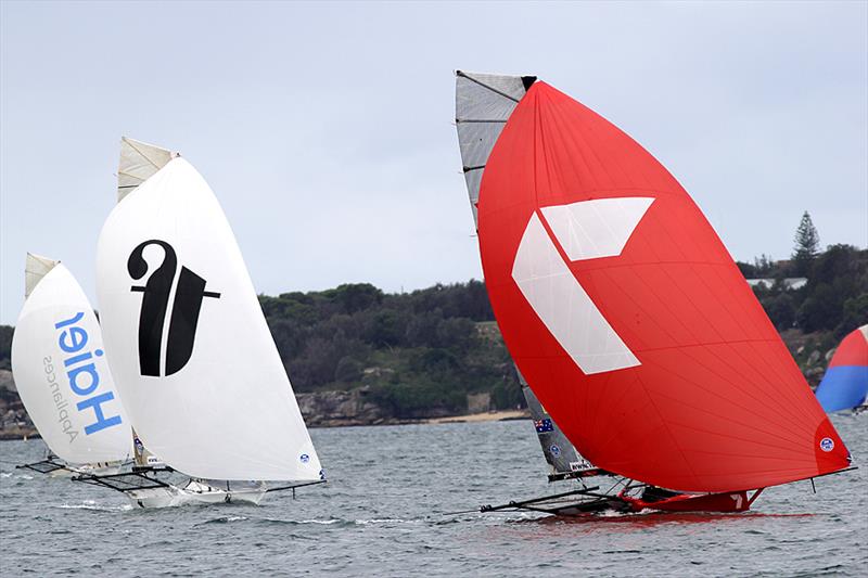 The finish as Gotta Love It 7 edges out Thurlow Fisher Lawyers in the rescheduled race 1 of the 2014 JJ Giltinan Championship photo copyright Frank Quealey taken at Australian 18 Footers League and featuring the 18ft Skiff class