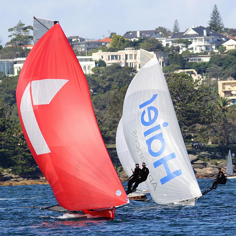 Gotta Love It 7 leads the UK's Haier Appliances down the first run in race 6 of the 2014 JJ Giltinan Championship photo copyright Frank Quealey taken at Australian 18 Footers League and featuring the 18ft Skiff class