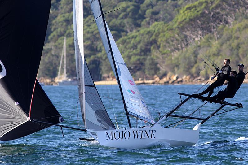 Mojo Wine makes a last desperate dive at the finish line in race 6 of the 2014 JJ Giltinan Championship photo copyright Frank Quealey taken at Australian 18 Footers League and featuring the 18ft Skiff class