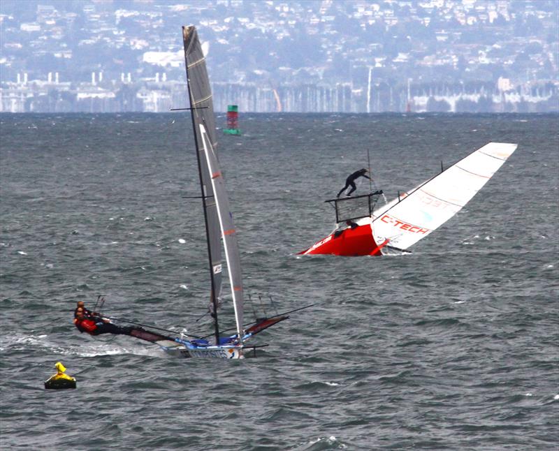 New Zealand's Events Clothing takes a dive off the start line on day 4 of the 18' Skiff International Regatta in San Francisco photo copyright Rich Roberts taken at St. Francis Yacht Club and featuring the 18ft Skiff class