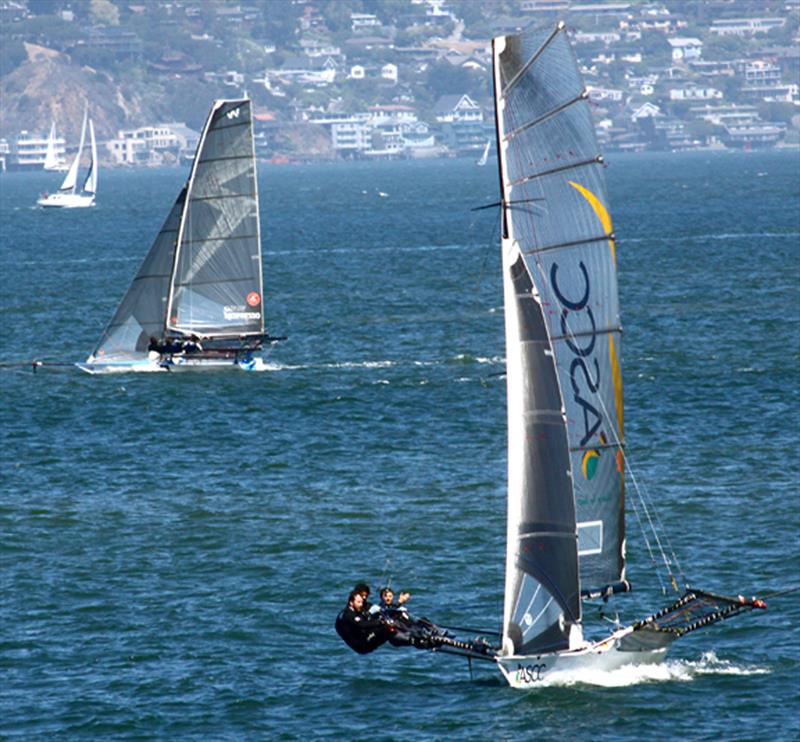 Howie Hamlin (left) never capsized but couldn't quite catch ASCC (right) at the 18' Skiff International Regatta in San Francisco photo copyright Rich Roberts taken at St. Francis Yacht Club and featuring the 18ft Skiff class