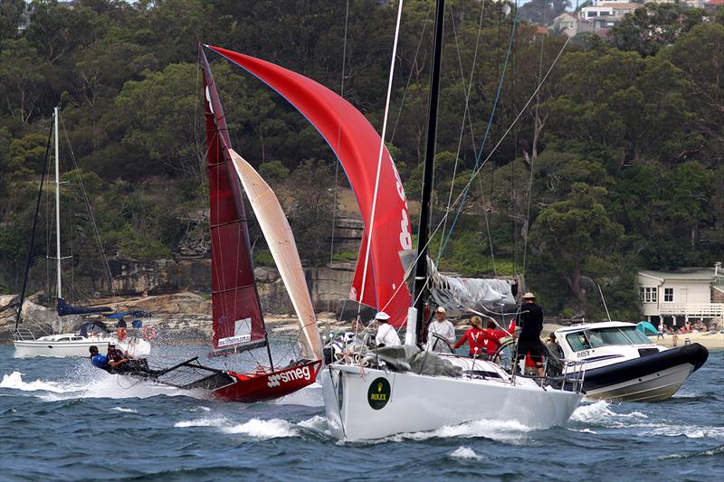 Smeg takes on Sydney Harbour traffic on her way to victory during the W.C 'Trappy' Duncan Memorial Trophy photo copyright Frank Quealey taken at  and featuring the 18ft Skiff class