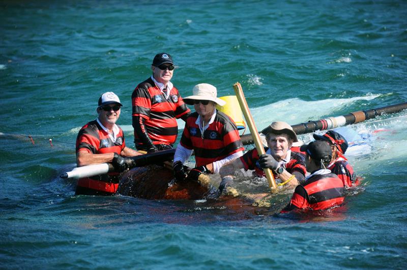 Harold Cudmore (holding the broken tiller) and the crew of Yendys in the drink during the Historical Skiff Australian Championship photo copyright Andrea Francolini taken at Sydney Flying Squadron and featuring the 18ft Skiff class