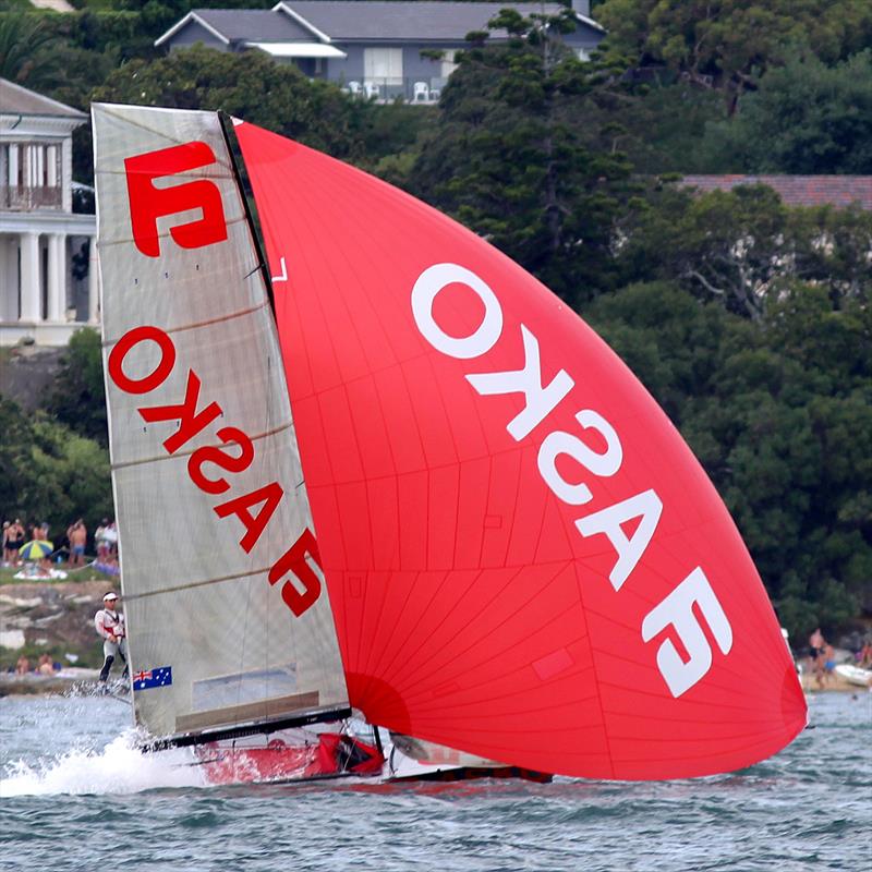 Asko Appliances shows her pace on the spinnaker run into Rose Bay during race 3 of the NSW Championship photo copyright Frank Quealey taken at  and featuring the 18ft Skiff class