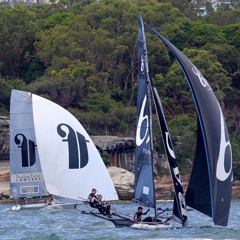 Coopers 62-Rag and Famish Hotel battle for the early lead during race 3 of the NSW Championship photo copyright Frank Quealey taken at  and featuring the 18ft Skiff class