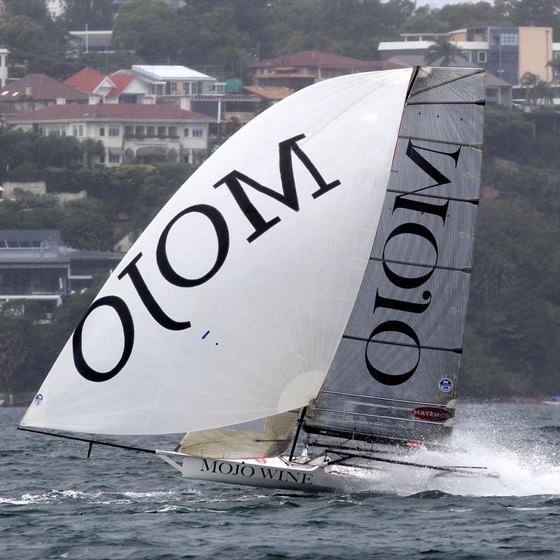 Mojo Wine powers down the spinnaker run during race 3 of the 18ft Skiff NSW Championship photo copyright Frank Quealey taken at Australian 18 Footers League and featuring the 18ft Skiff class