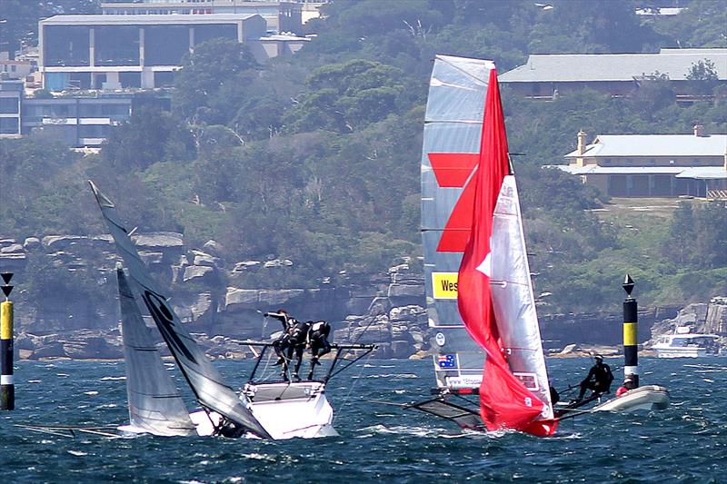 Thurlow Fisher capsizes as Gotta Love It 7 sails through during the 18ft Skiff W.C. (Trappy) Duncan Memorial Trophy photo copyright Frank Quealey taken at Australian 18 Footers League and featuring the 18ft Skiff class