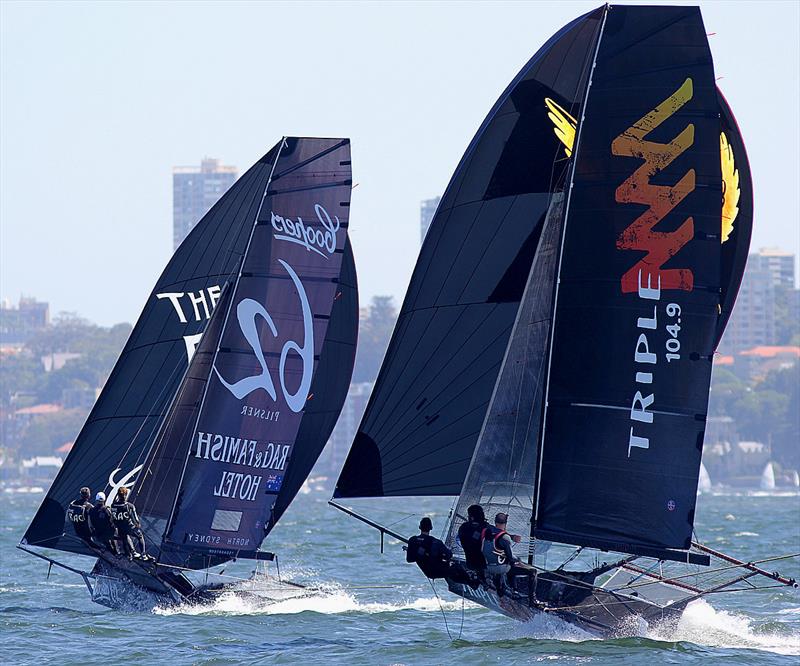 Coopers 62-Rag and Famish leads Triple M down the first spinnaker run during race 1 of the 18ft Skiff Australian Championship photo copyright Frank Quealey taken at Sydney Flying Squadron and featuring the 18ft Skiff class