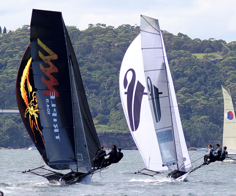 Triple M and Thurlow Fisher Lawyers enjoyed a lengthy battle for a long part of race 2 of the 18ft Skiff Australian Championship - photo © Frank Quealey