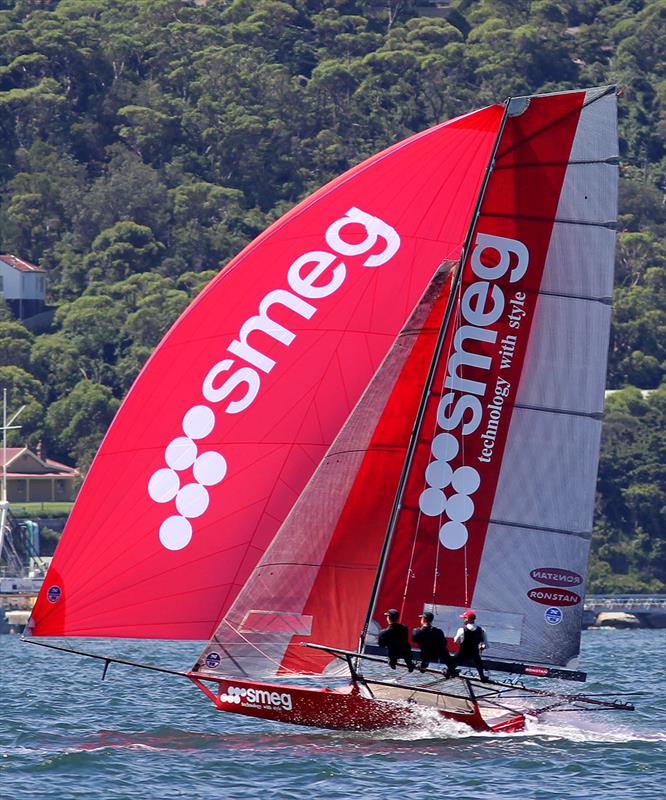 The Smeg crew seem so relaxed as they power downwind on the first spinnaker run in race 2 of the 18ft Skiff Australian Championship photo copyright Frank Quealey taken at Sydney Flying Squadron and featuring the 18ft Skiff class
