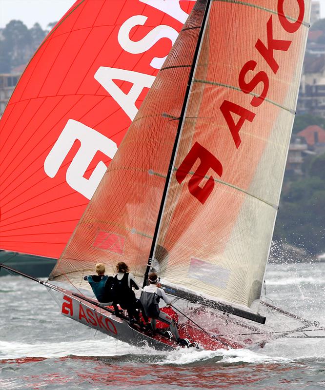 Despite the lack of wind, Asko Appliances becomes airborne as she hits the bow wave of a passing speed boat during race 3 of the 18ft Skiff Australian Championship photo copyright Frank Quealey taken at Australian 18 Footers League and featuring the 18ft Skiff class