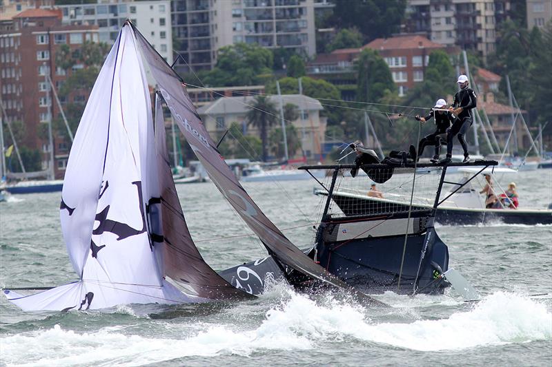 Coopers 62-Rag and Famish Hotel, one of many skiffs to capsize on a wild race 5 of the 18ft Skiff Australian Championship photo copyright Frank Quealey taken at Australian 18 Footers League and featuring the 18ft Skiff class