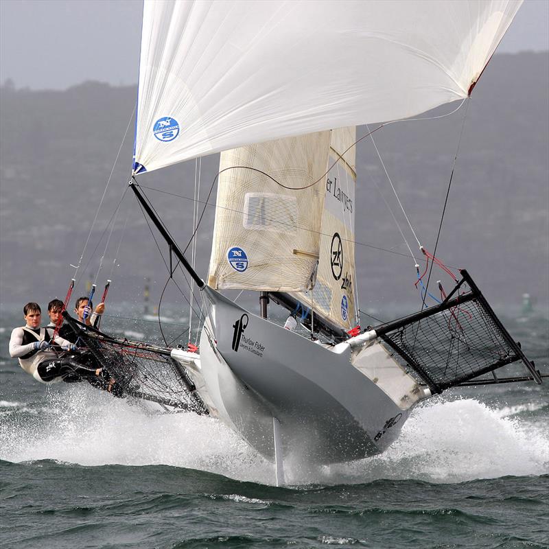 Trent, David and Michael airborne photo copyright Frank Quealey taken at Australian 18 Footers League and featuring the 18ft Skiff class