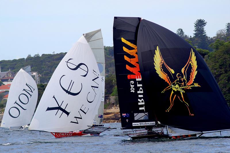 Close spinnaker action between Triple M, Compassmarkets.com and Mojo Wine in the 18ft Skiff Alice Burton Memorial Trophy photo copyright Frank Quealey taken at Australian 18 Footers League and featuring the 18ft Skiff class