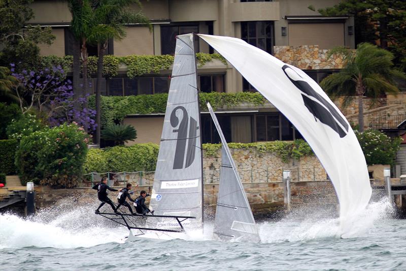 The wild capsize that cost Thurlow Fisher Lawyers the win in race 1 of the NSW Championship - photo © Frank Quealey