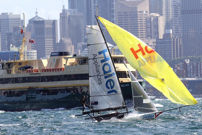 Sydney Harbour traffic tests the Haier Applicances crew photo copyright Frank Quealey taken at Australian 18 Footers League and featuring the 18ft Skiff class