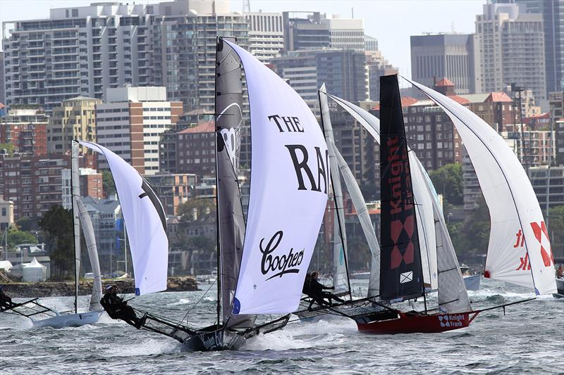 Coopers 62-Rag and Famish Hotel leads a group of skiffs shortly after the first windward mark during 18ft Skiff 2017 JJ Giltinan Championship race 2 photo copyright Frank Quealey taken at Australian 18 Footers League and featuring the 18ft Skiff class