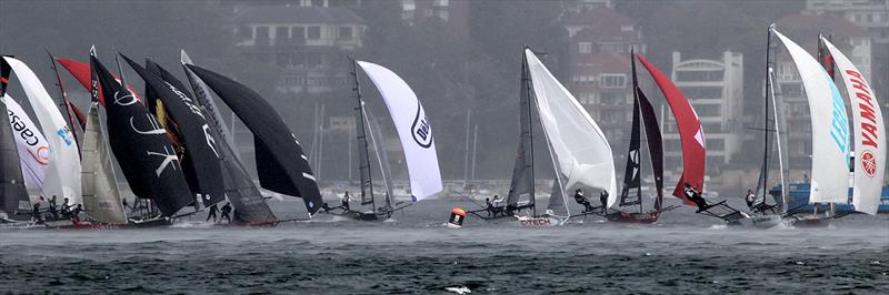 Action at the wing mark as the rain squall starts to hit during 18ft Skiff 2017 JJ Giltinan Championship race 3 - photo © Frank Quealey