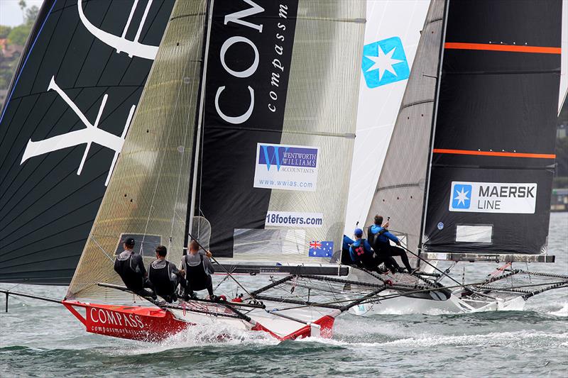 Compassmarkets struggles to get over the top of Maersk Line from New Zealand during 18ft Skiff 2017 JJ Giltinan Championship race 4 photo copyright Frank Quealey taken at Australian 18 Footers League and featuring the 18ft Skiff class