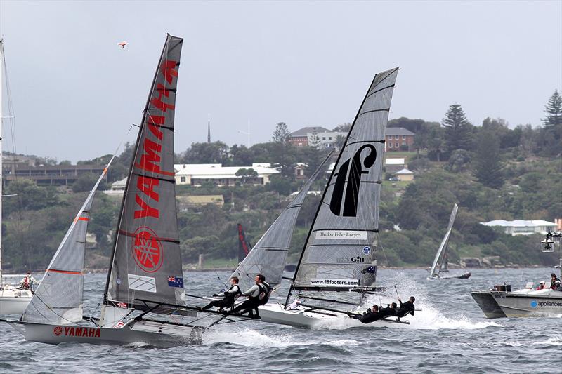 Yamaha and Thurlow Fisher Lawyers reaching on the run to the bottom mark in 18ft Skiff 2017 JJ Giltinan Championship race 7 photo copyright Frank Quealey taken at Australian 18 Footers League and featuring the 18ft Skiff class