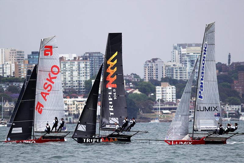 Asko Appliances. Triplem and Panasonic Lumix shared the houours for most of the first windward leg during race 3 of the 18ft Skiff Spring Championship in Sydney photo copyright Frank Quealey taken at Australian 18 Footers League and featuring the 18ft Skiff class