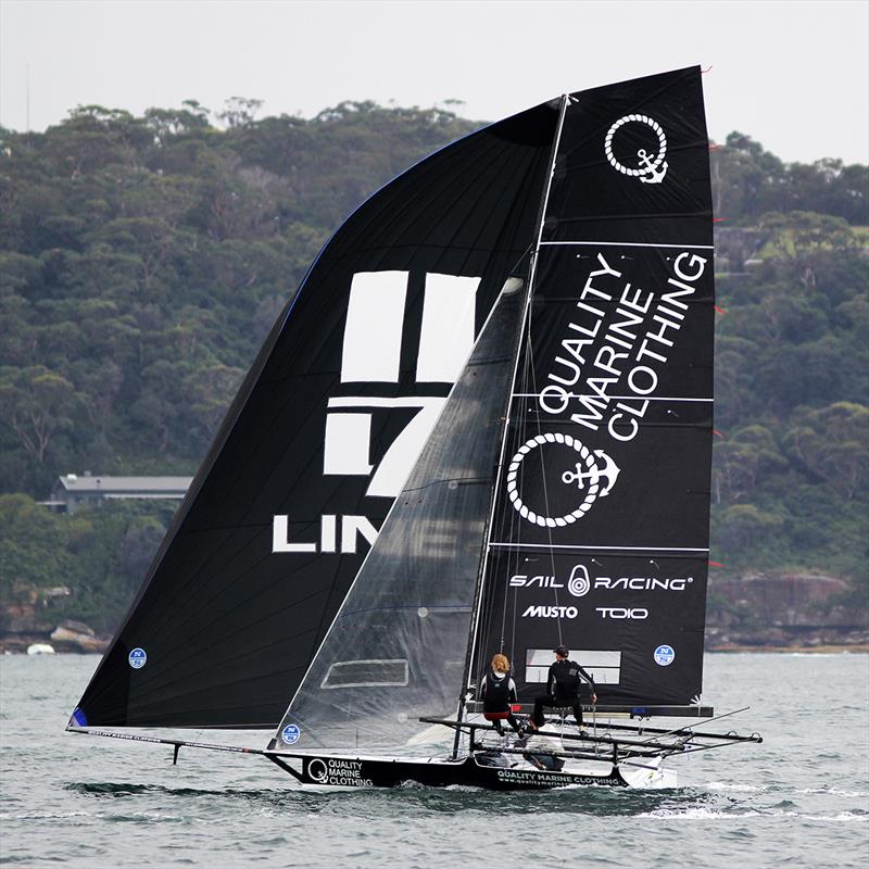 Quality Marine Clothing led the fleet to the Clark Island wing mark during race 3 of the 18ft Skiff Spring Championship in Sydney photo copyright Frank Quealey taken at Australian 18 Footers League and featuring the 18ft Skiff class