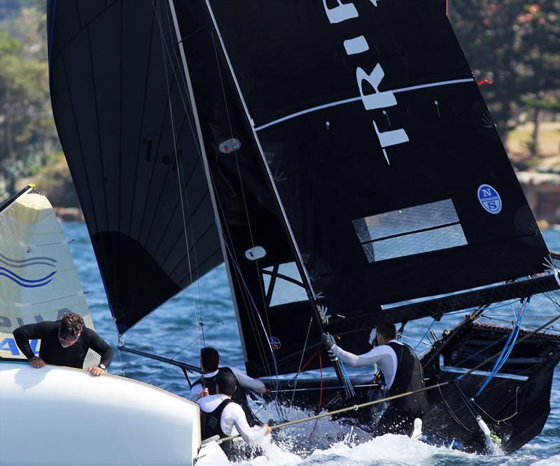 A near miss for Triple M as she avoids a Finn on the run into Rose Bay during race 4 of the 18ft Skiff Spring Championship in Sydney photo copyright Frank Quealey taken at Australian 18 Footers League and featuring the 18ft Skiff class