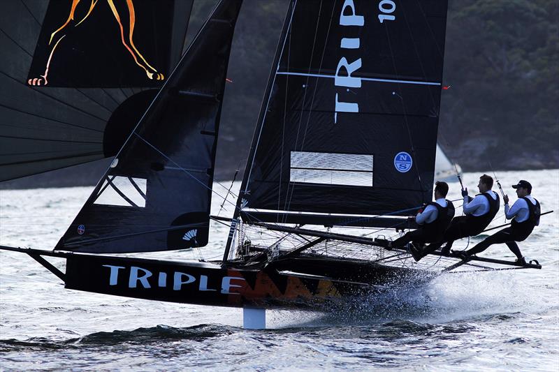 The Triple M crew drive their skiff at full speed during race 4 of the 18ft Skiff Spring Championship in Sydney photo copyright Frank Quealey taken at Australian 18 Footers League and featuring the 18ft Skiff class