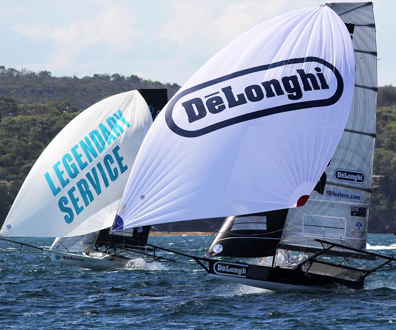 Today's winner De'Longhi in close action on the first spinnaker run during race 4 of the 18ft Skiff Spring Championship in Sydney photo copyright Frank Quealey taken at Australian 18 Footers League and featuring the 18ft Skiff class
