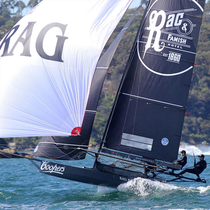 The Rag team ride a bow wave down the second run to the bottom mark during race 6 of the 18ft Skiff Spring Championship in Sydney photo copyright Frank Quealey taken at Australian 18 Footers League and featuring the 18ft Skiff class