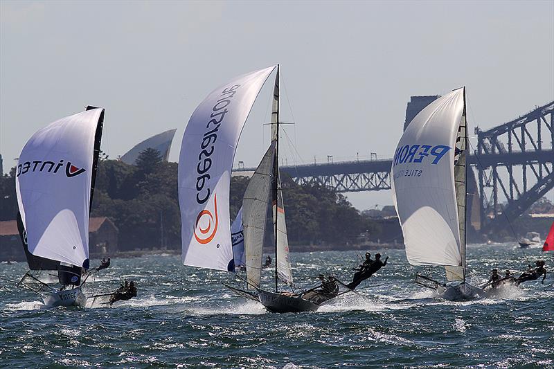 Leaders charge down the first spinnaker run during the 18ft Skiff Queen of the Harbour photo copyright Frank Quealey taken at Australian 18 Footers League and featuring the 18ft Skiff class