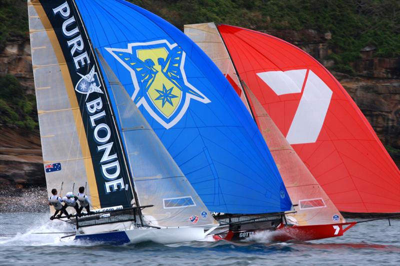 Pure Blonde and 7 on tight spinnaker run during the Mick Scully Memorial Trophy photo copyright Frank Quealey taken at Sydney Flying Squadron and featuring the 18ft Skiff class