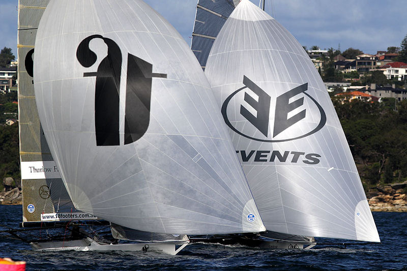 Thurlow Fisher Lawyers and Events Clothing battle near the lead on the second spinnaker run in race 2 of the 64th JJ Giltinan Championship photo copyright Frank Quealey taken at Australian 18 Footers League and featuring the 18ft Skiff class