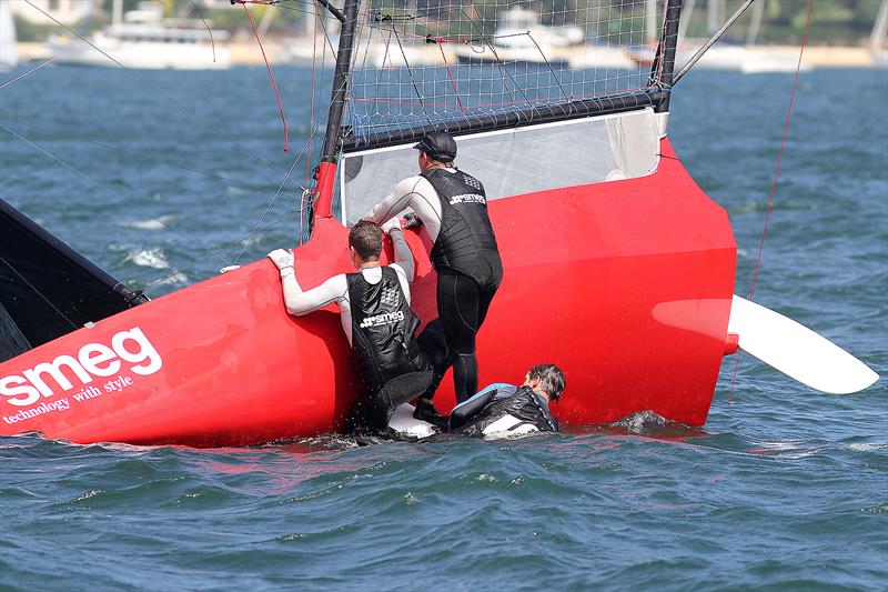 After winning Race 1 the Smeg team missed the start by several minutes after a pre start capsize, Race 2, Australian National Championships, Sydney, January 28, 2018 photo copyright Frank Quealey taken at Australian 18 Footers League and featuring the 18ft Skiff class
