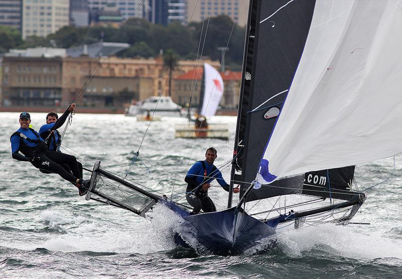 Seve Jarvin, Sam Newton and Matt Stenta bring the new Andoo skiff to the finish line in Race 1 - 18ft Skiffs Supercup - December 2021 photo copyright Frank Quealey taken at Australian 18 Footers League and featuring the 18ft Skiff class