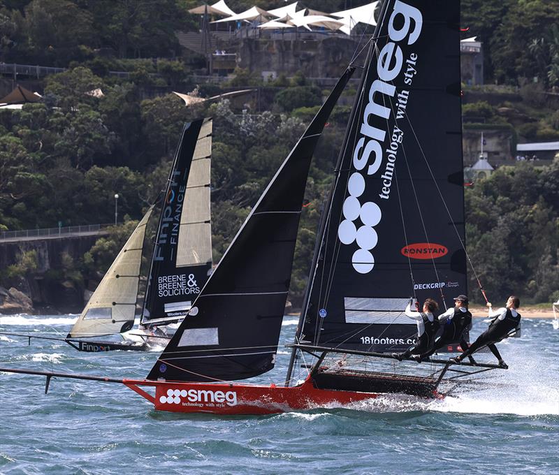 Smeg and Finport Finance battle for the lead on the spinnaker runto the bottom mark at Robertson Point during race 1 of the 100th 18ft Skiff Australian Championship photo copyright Michael Chittenden taken at Australian 18 Footers League and featuring the 18ft Skiff class