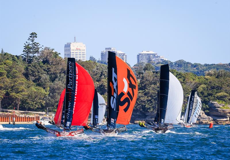 Fleet spinnaker run during the final race of the 18ft Skiff Winnings 2024 JJ Giltinan Championship photo copyright SailMedia taken at Australian 18 Footers League and featuring the 18ft Skiff class