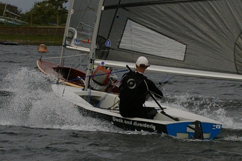 Solo Open at Island Barn : Close Action with Godfrey Clark and Paul Playle hammering down a reach photo copyright Jim Champ taken at Island Barn Reservoir Sailing Club and featuring the Solo class