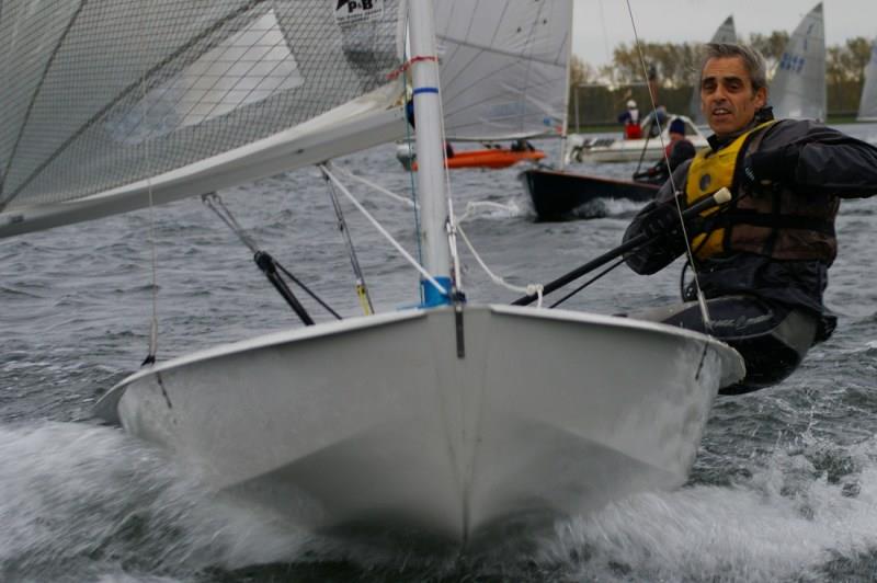Solo Open at Island Barn : 6th placer CJ Cavallari decides to intimidate the camera boat between races photo copyright Jim Champ taken at Island Barn Reservoir Sailing Club and featuring the Solo class