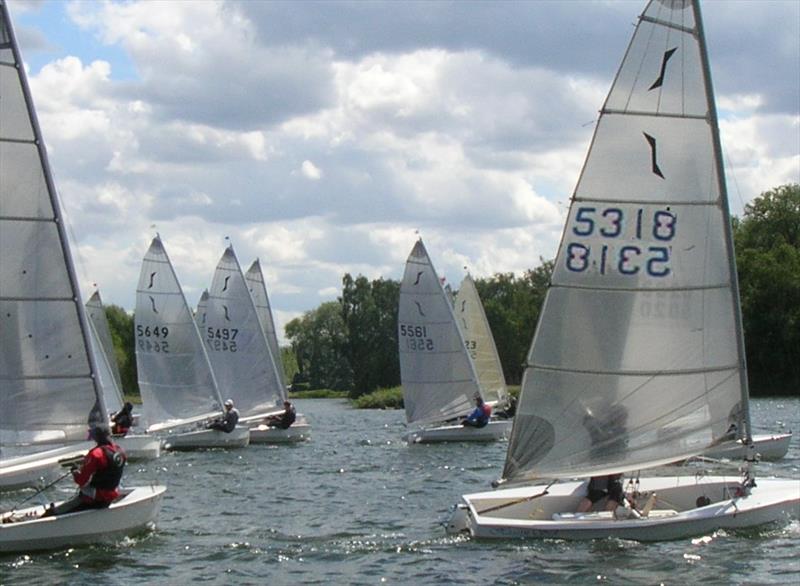 Solos at Wroxham Broad photo copyright Godfrey Clark taken at Norfolk Broads Yacht Club and featuring the Solo class