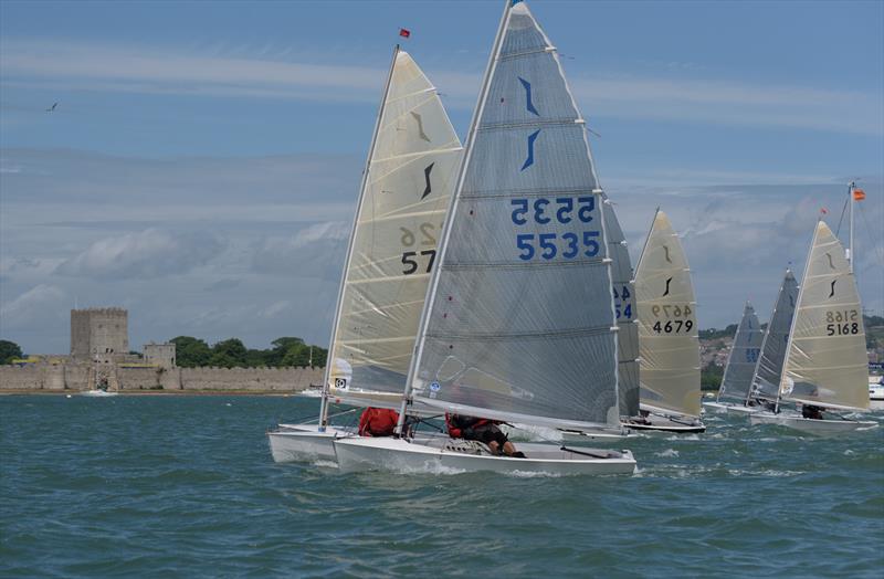 Portchester Castle makes an impressive backdrop during the Portchester Solo Open photo copyright Chris Raymont taken at Portchester Sailing Club and featuring the Solo class