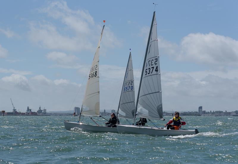 Jonathan Otter leads Chris Davies during the Portchester Solo Open photo copyright Chris Raymont taken at Portchester Sailing Club and featuring the Solo class